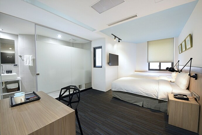 Imagen de la habitación del Hotel Hommie Inn. Foto 14