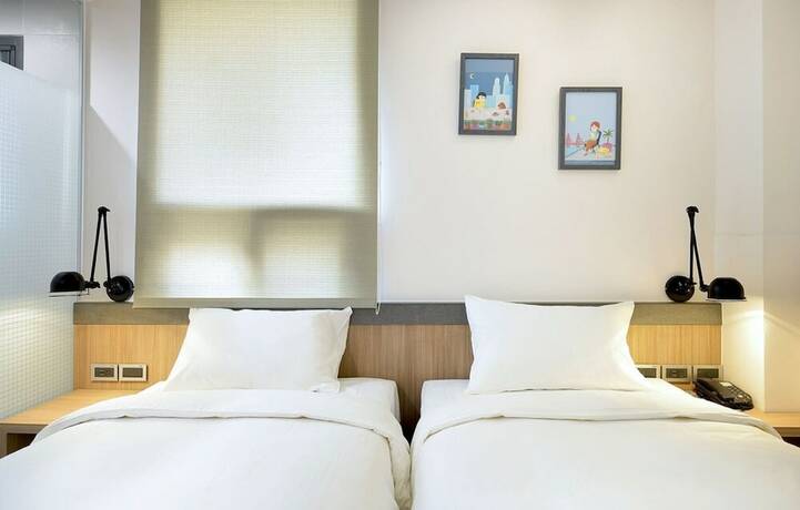 Imagen de la habitación del Hotel Hommie Inn. Foto 17