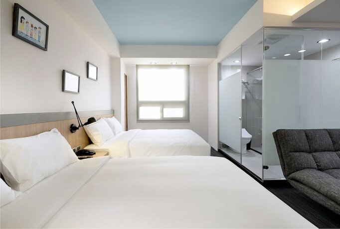 Imagen de la habitación del Hotel Hommie Inn. Foto 18