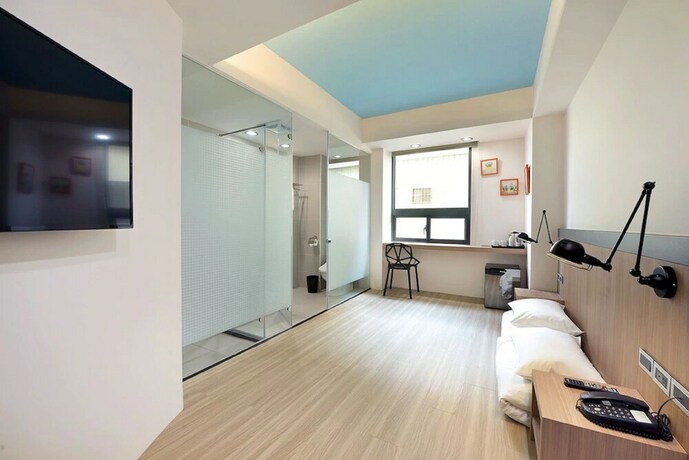 Imagen de la habitación del Hotel Hommie Inn. Foto 21