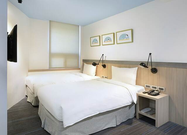 Imagen de la habitación del Hotel Hommie Inn. Foto 23