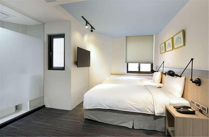 Imagen de la habitación del Hotel Hommie Inn. Foto 25