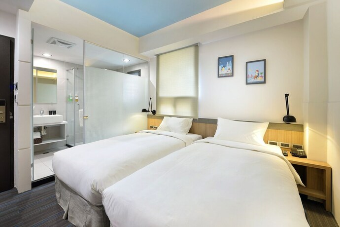 Imagen de la habitación del Hotel Hommie Inn. Foto 26