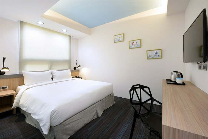 Imagen de la habitación del Hotel Hommie Inn. Foto 30