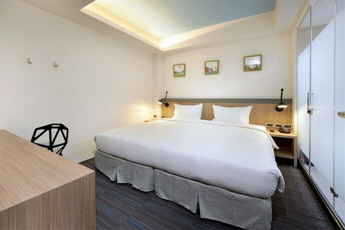Imagen de la habitación del Hotel Hommie Inn. Foto 32