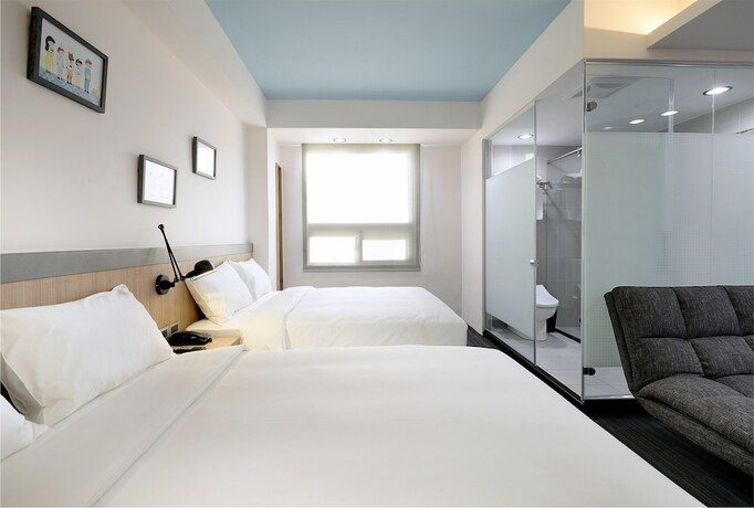 Imagen de la habitación del Hotel Hommie Inn. Foto 36