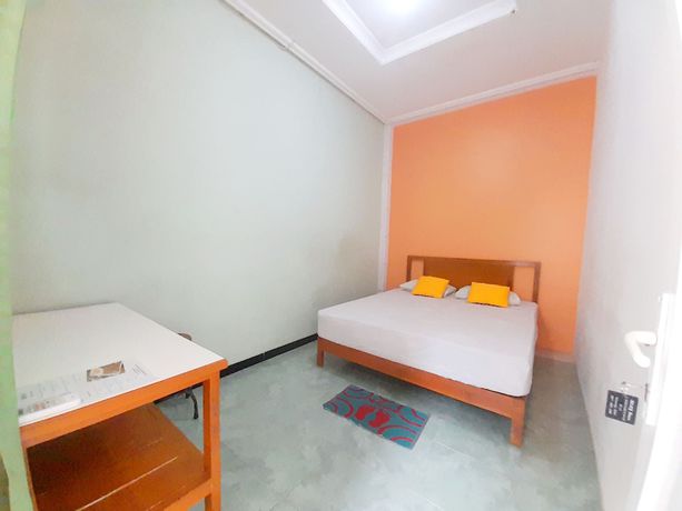 Imagen de la habitación del Hotel Homy House Semarang. Foto 2