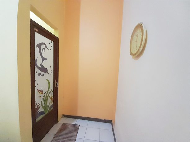Imagen de la habitación del Hotel Homy House Semarang. Foto 3