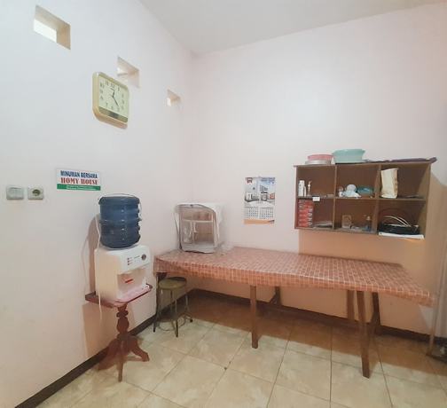 Imagen de la habitación del Hotel Homy House Semarang. Foto 4