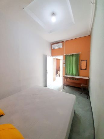 Imagen de la habitación del Hotel Homy House Semarang. Foto 5