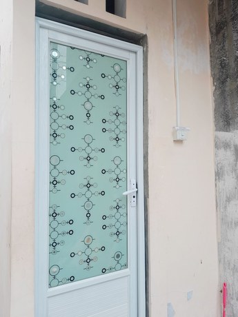 Imagen de la habitación del Hotel Homy House Semarang. Foto 12
