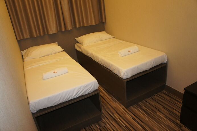 Imagen de la habitación del Hotel Homy Inn North Point. Foto 11