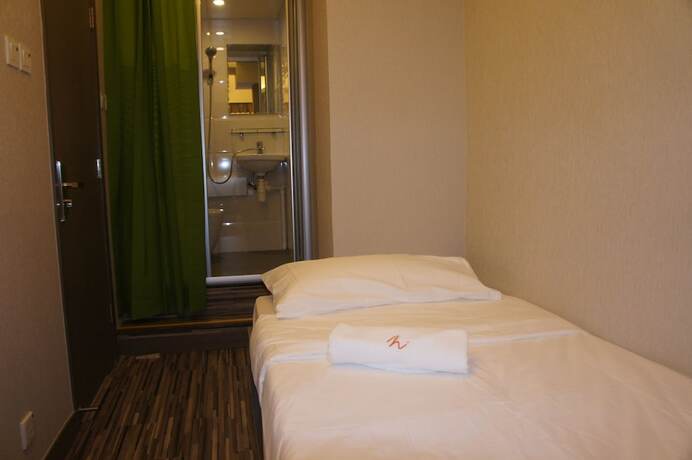 Imagen de la habitación del Hotel Homy Inn North Point. Foto 13