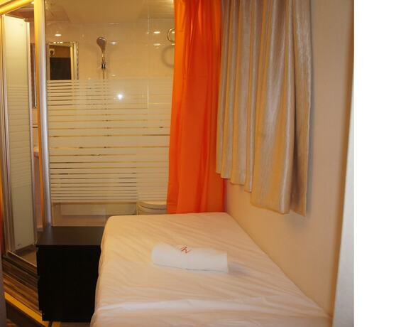 Imagen de la habitación del Hotel Homy Inn North Point. Foto 18
