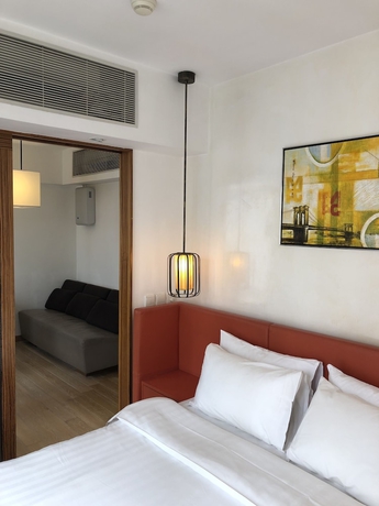 Imagen de la habitación del Hotel Homy Residence. Foto 7