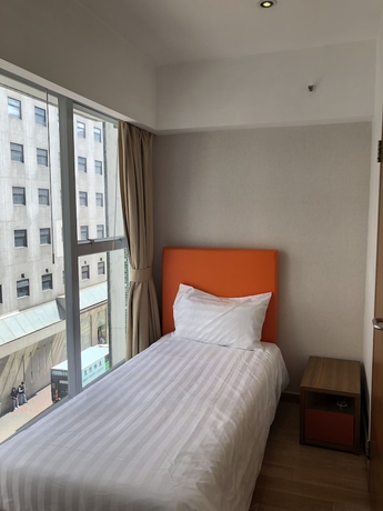 Imagen de la habitación del Hotel Homy Residence. Foto 9