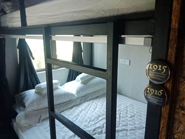 Imagen de la habitación del Hotel Homy Seafront Hostel. Foto 13