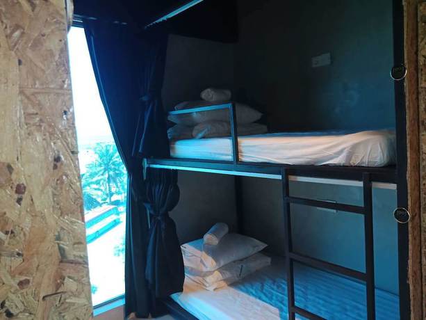 Imagen de la habitación del Hotel Homy Seafront Hostel. Foto 15