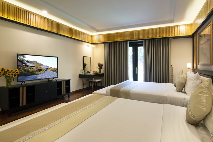 Imagen de la habitación del Hotel Hon Tam Resort. Foto 4