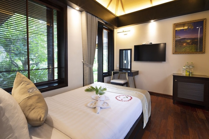 Imagen de la habitación del Hotel Hon Tam Resort. Foto 7