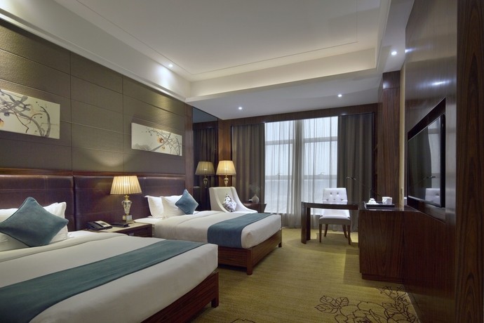 Imagen de la habitación del Hotel Honder International. Foto 10