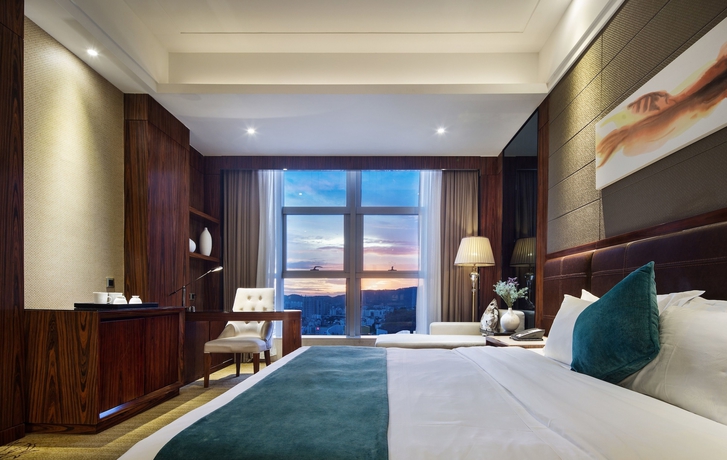 Imagen de la habitación del Hotel Honder International. Foto 12