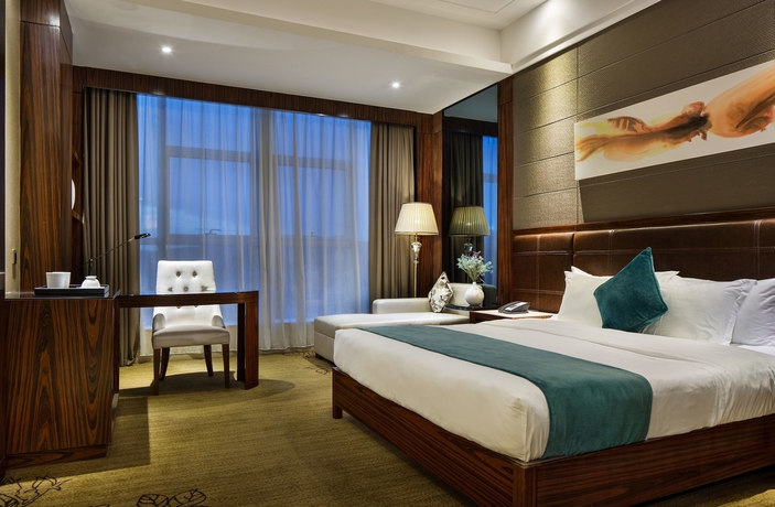 Imagen de la habitación del Hotel Honder International. Foto 14