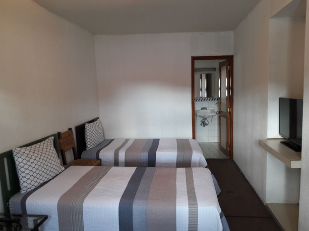 Imagen de la habitación del Hotel Honduras Executive Inn at Palmira. Foto 1