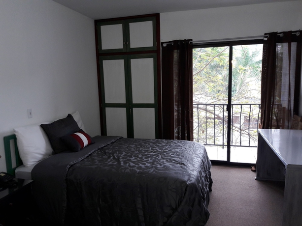 Imagen de la habitación del Hotel Honduras Executive Inn at Palmira. Foto 5