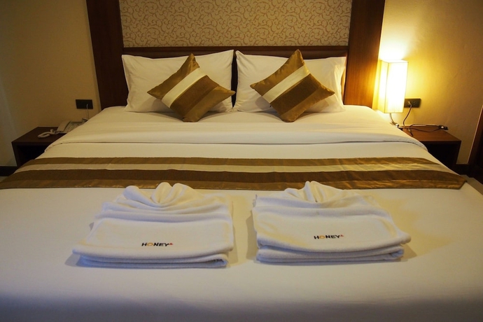 Imagen de la habitación del Hotel Honey Inn. Foto 7