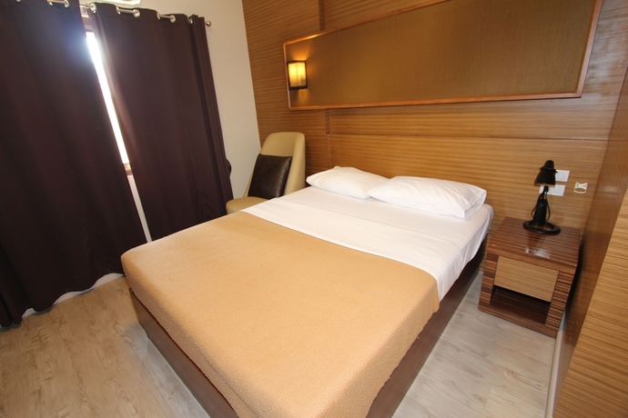Imagen de la habitación del Hotel Honey Lodge. Foto 2