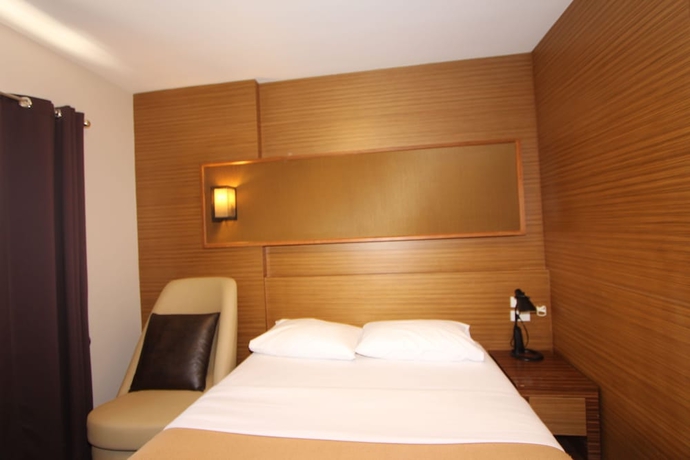 Imagen de la habitación del Hotel Honey Lodge. Foto 3