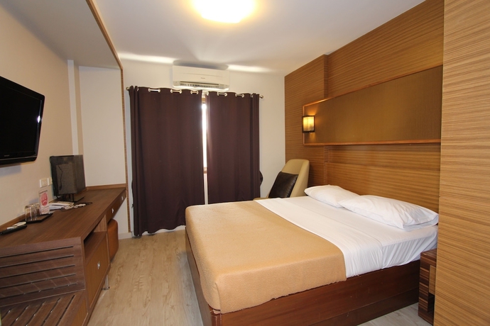 Imagen de la habitación del Hotel Honey Lodge. Foto 5