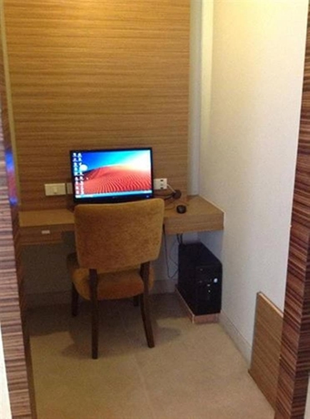 Imagen de la habitación del Hotel Honey Lodge. Foto 6