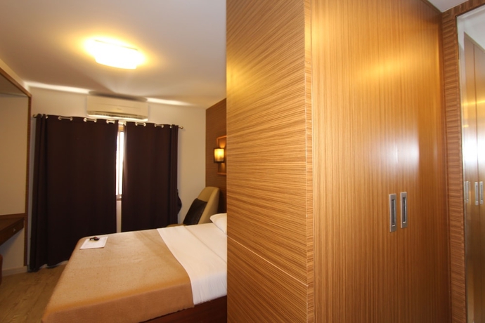 Imagen de la habitación del Hotel Honey Lodge. Foto 7
