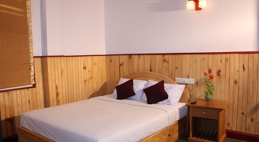 Imagen de la habitación del Hotel Honey Pine. Foto 11