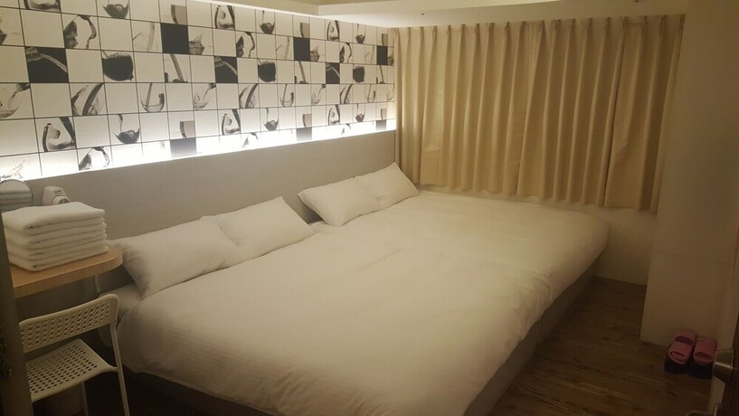 Imagen de la habitación del Hotel Honey Prince. Foto 17