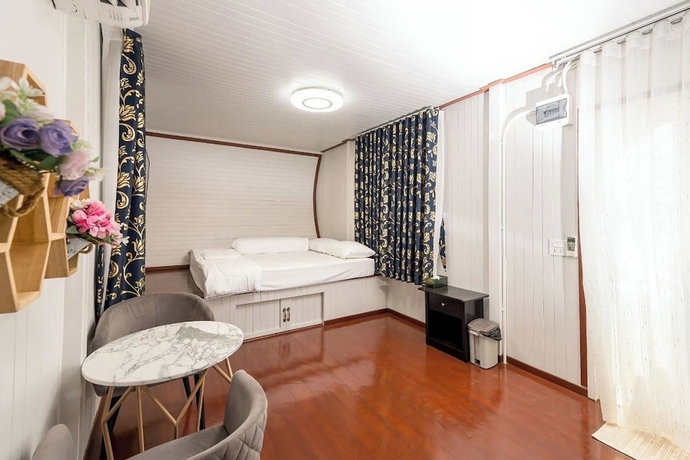 Imagen de la habitación del Hotel Honey Queen Resort. Foto 10