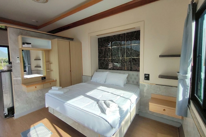 Imagen de la habitación del Hotel Honey Queen Resort. Foto 11