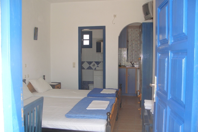 Imagen de la habitación del Hotel Honeymoon Beach Studios. Foto 4