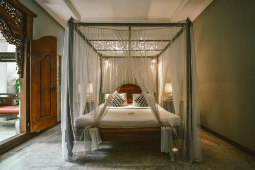 Imagen de la habitación del Hotel Honeymoon Guesthouse. Foto 10