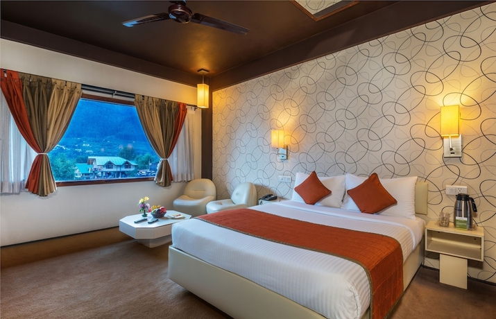 Imagen de la habitación del Hotel Honeymoon Inn Manali. Foto 5