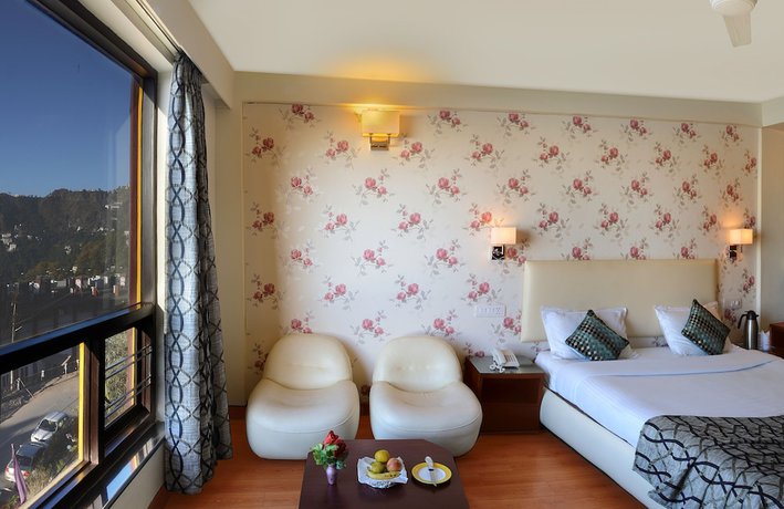Imagen de la habitación del Hotel Honeymoon Inn, Mussoorie. Foto 11