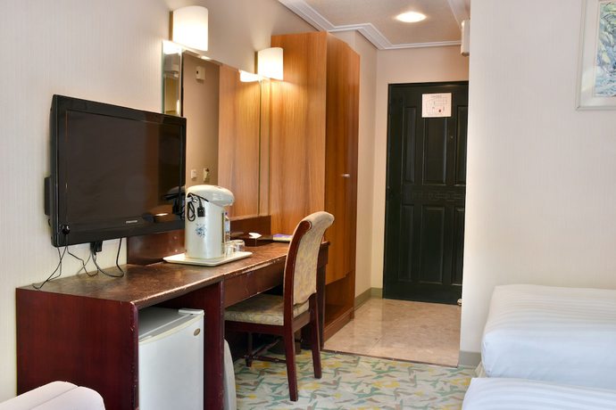 Imagen de la habitación del Hotel Honeymoon, Mhebu. Foto 12