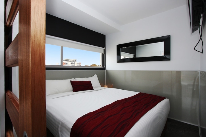 Imagen de la habitación del Hotel Honeysuckle Executive Apartments. Foto 5