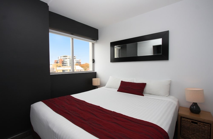 Imagen de la habitación del Hotel Honeysuckle Executive Apartments. Foto 10