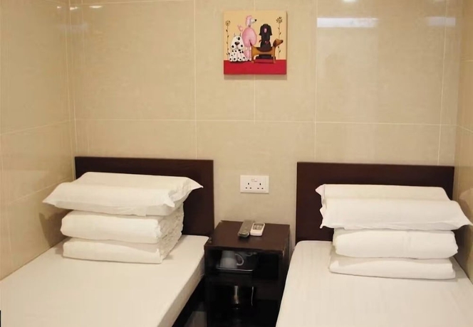 Imagen de la habitación del Hotel Hong Kong Full Harvest Inn. Foto 3