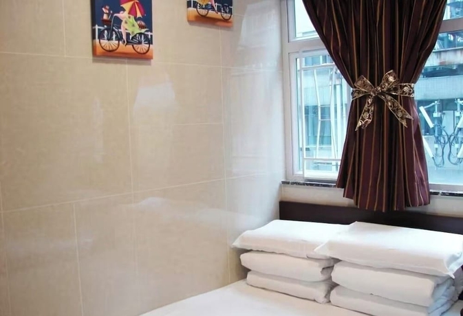 Imagen de la habitación del Hotel Hong Kong Full Harvest Inn. Foto 14