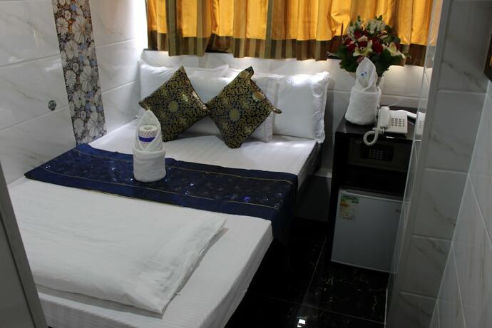 Imagen de la habitación del Hotel Hong Kong Premium Guest House. Foto 16