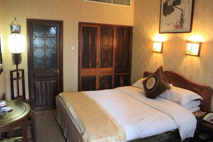 Imagen de la habitación del Hotel Hong Shan Yi. Foto 11